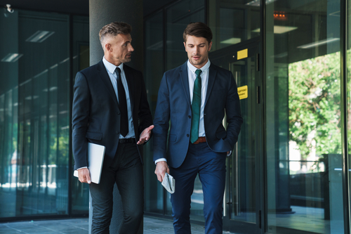 Two businessmen talking