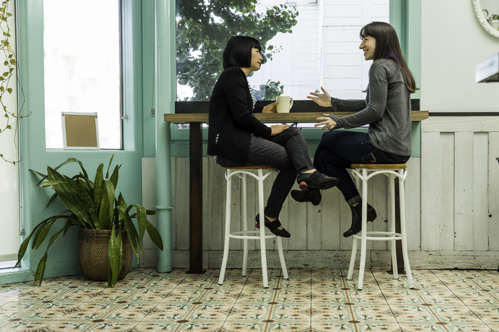 Two women chatting