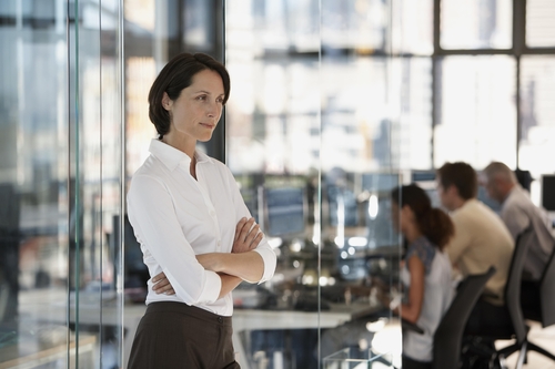 A businesswoman looking at a distance