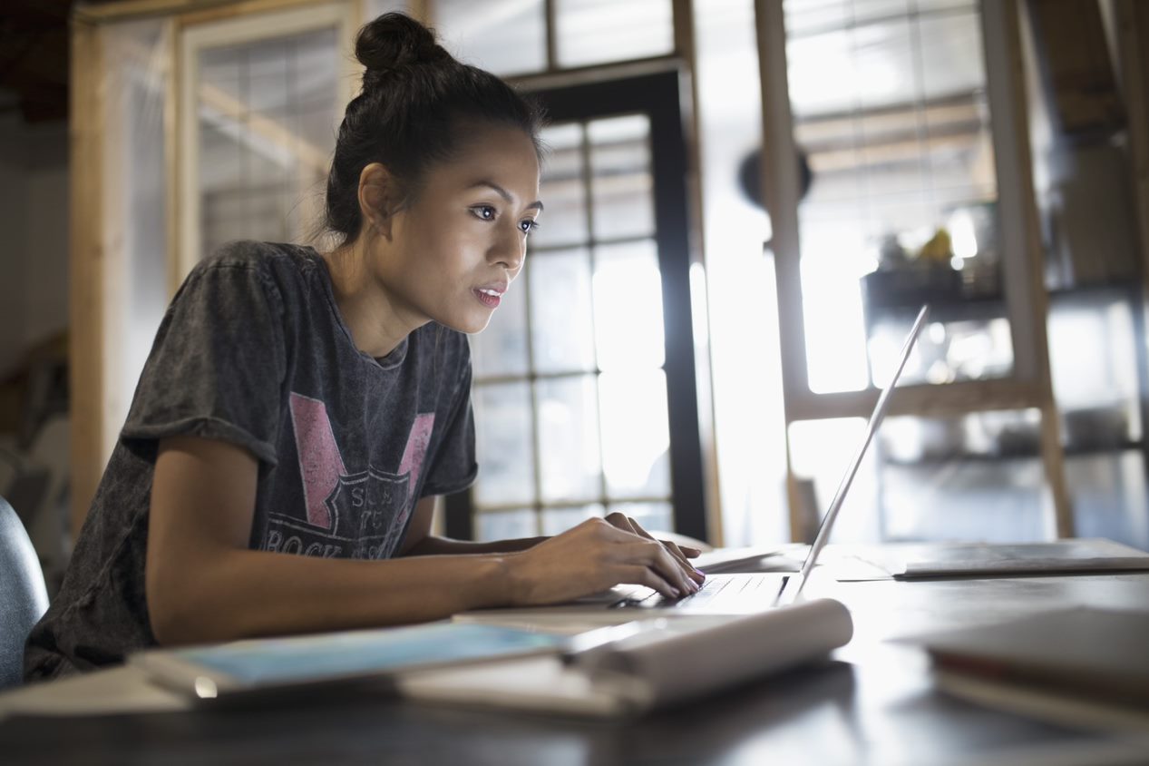 Businesswoman looking at a laptop