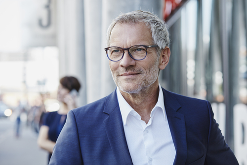 A senior businessman looking at a distance