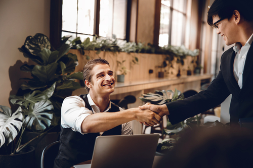 A businessman doing an interview and answering the most common questions