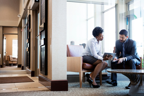 two businesspeople talking