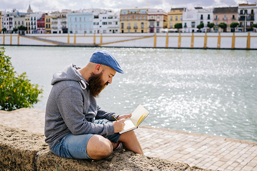 side-view-bearded-male-art-student