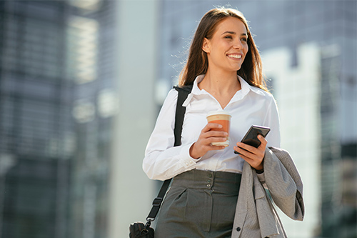 beautiful-woman-going-work-coffee-walking