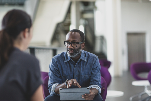 two businesspeople talking
