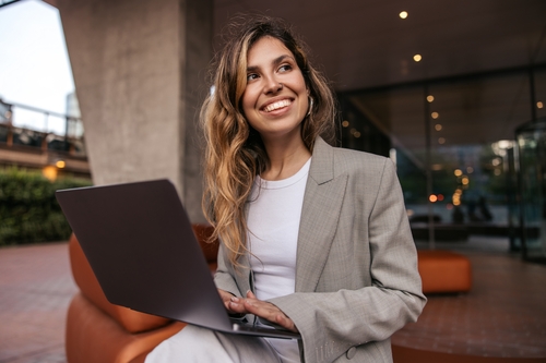 businesswoman holding a laptop