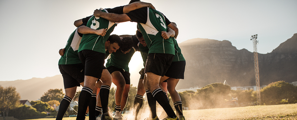 Picture of male football team cheering