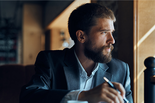 man looking through the window