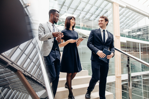 three businesspeople talking