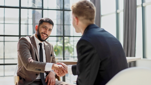 two businessmen shaking hands