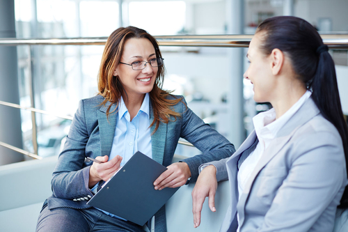 two businesswomen talking