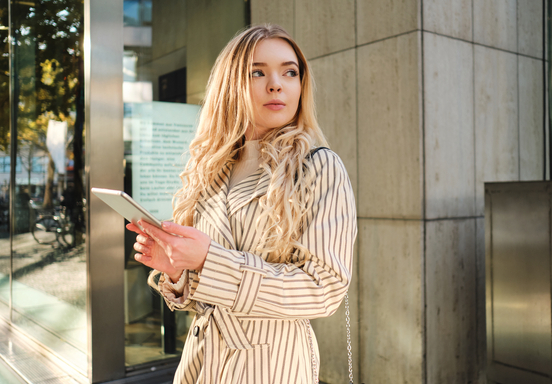 woman holding phone