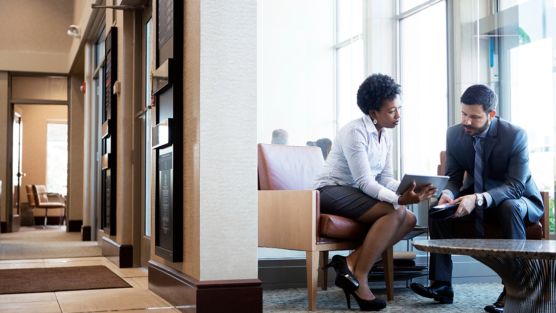 Two businesspeople talking